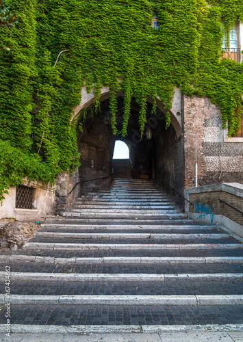 Fototapeta Naklejka Na Ścianę i Meble -  Rome (Italy) - The Staircase or Climb of the Borgia, one of the most suggestive corners of the Italy's Capital