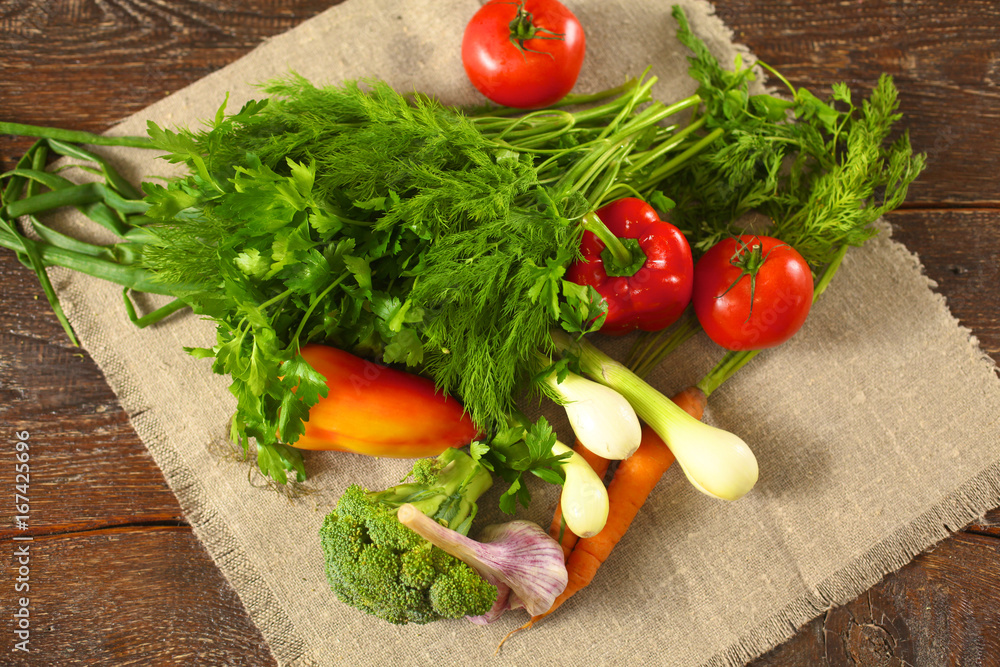 Fresh vegetables on a wooden table. Healthy food. Diet