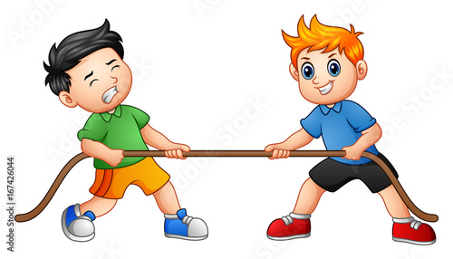 Cute children playing tug of war