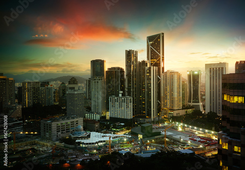 Cityscape with modern and developmental ,twilight scene ,Kuala Lumpur ,Malaysia .