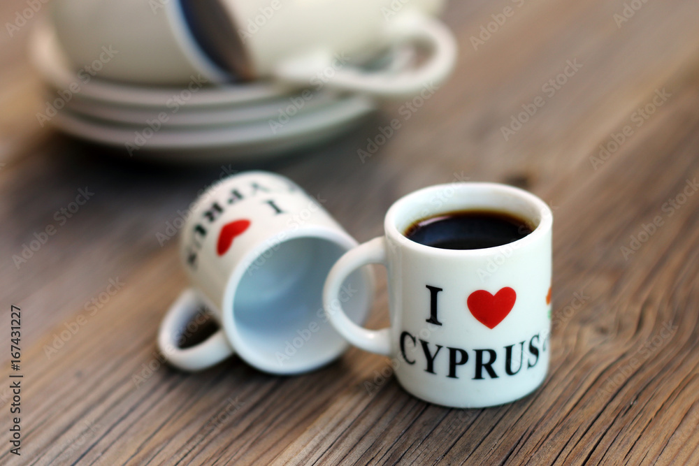 A couple of tiny souvenir cups for coffee, with an inscription "I LOVE  CYPRUS" Stock Photo | Adobe Stock