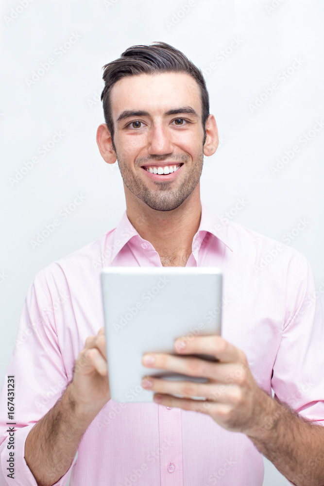 Smiling Handsome Business Man Using Tablet Smiling Handsome Business Man Using Tablet