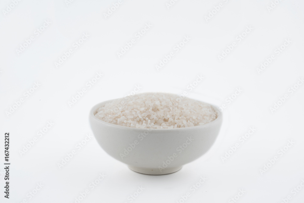 white rice, natural long rice grain for background and texture on white background white rice, natural long rice grain for background and texture on white background