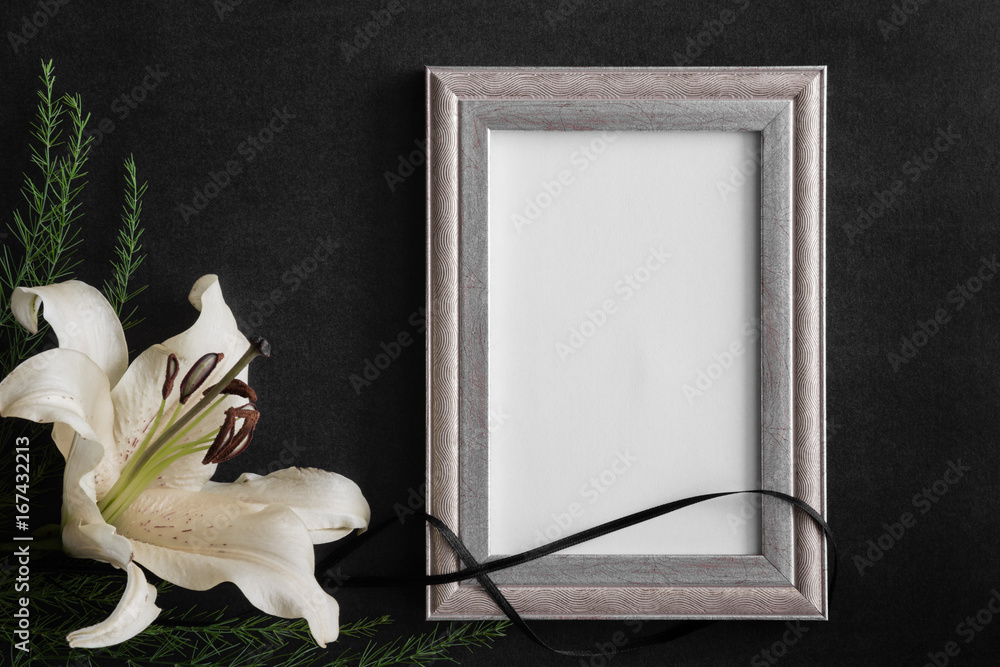 White blank condolence card with frame and lily flower on the dark  background. Empty place for a text or photo. Stock Photo | Adobe Stock
