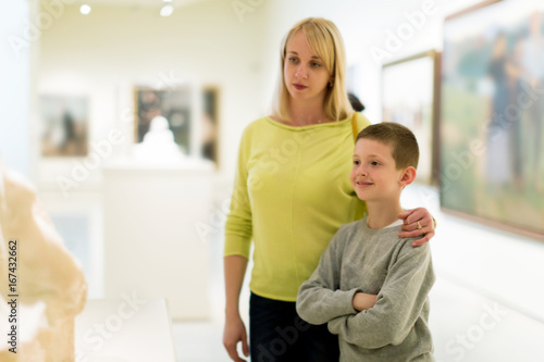 Mother and son exploring expositions