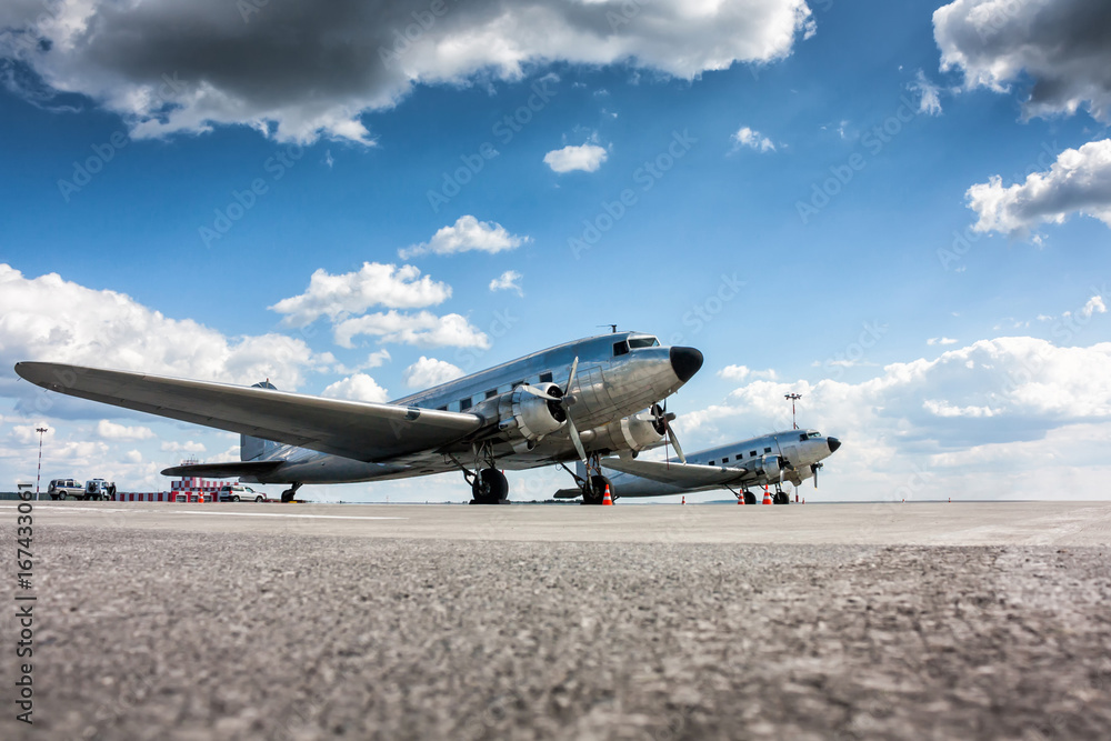 Retro passenger planes at the airport apron Retro passenger planes at the airport apron