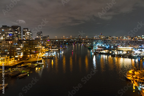 Night long exposure city shot with city lights and port © Martin Hossa