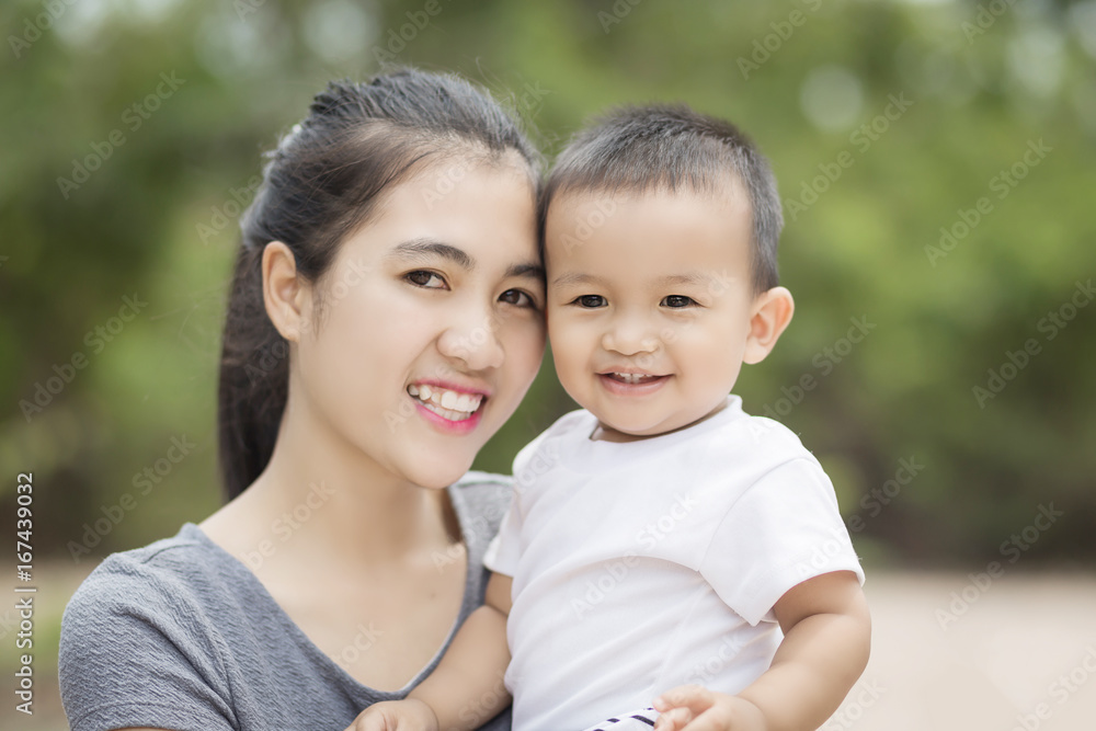 Mother play enjoying with her son in outdoor. Mother play enjoying with her son in outdoor.