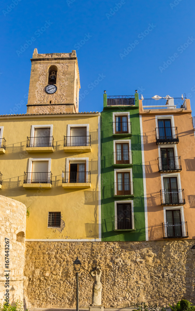 Colorful houses and church tower in Villajoyosa