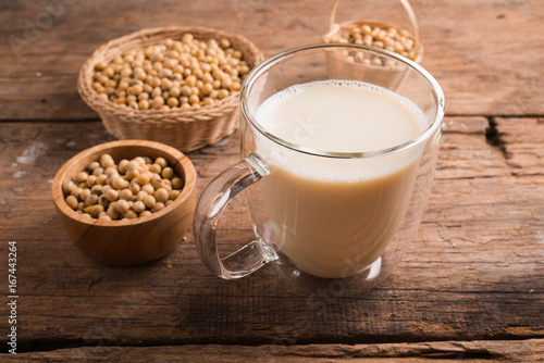 Glass with Soy Milk and Seeds on background