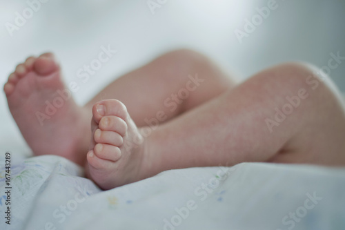 The legs of a child. Baby. Macro feet