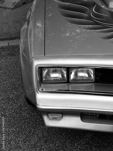 Fotografie, Obraz Doppelscheinwerfer eines amerikanischen Sportwagen und Coupé der späten Siebzige