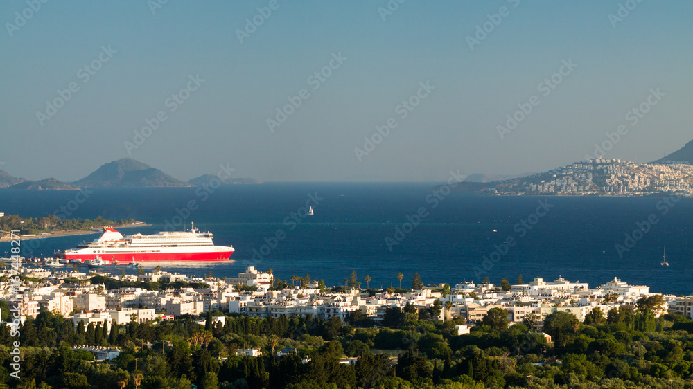 Big red and white ferry boat of the coast Kos island, Greece.