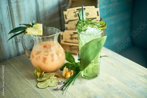 Creamy lemonade in a decanter with ice jpg photo