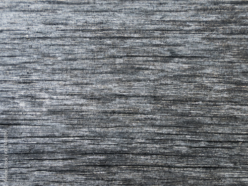 Old dark wood abstract texture plank wallpaper.