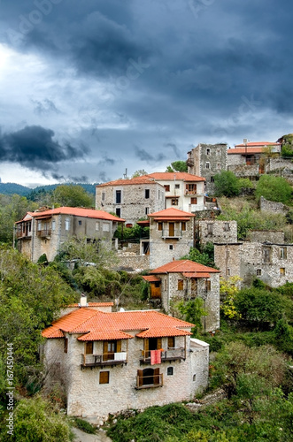 Traditional stone made houses in Stemnitsa village under a dramatic sky.Greece