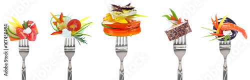 Photography Variety of vegetables and cheeses on forks - white background