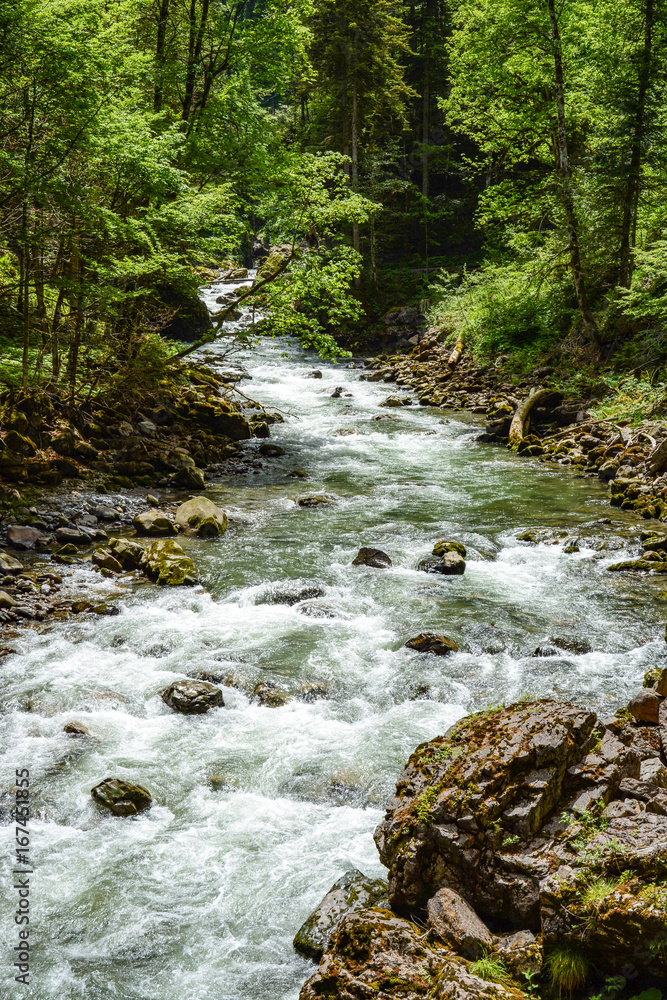 River flowing through the Breitachklamm Gorge River flowing through the Breitachklamm Gorge