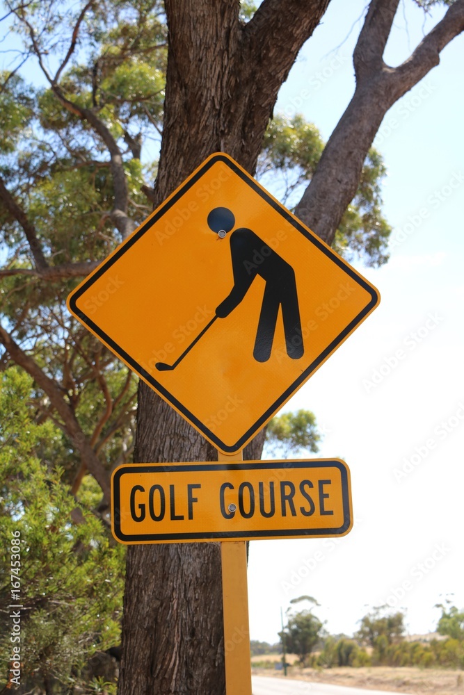 Road sign for Golf course on the road in West Australia