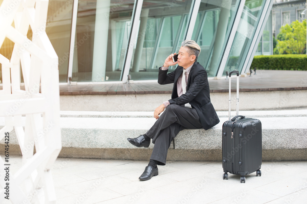 asian senior businessman travel with phone asian senior businessman travel with phone