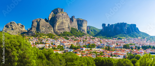 Kalampaka town with Metora cliffs and monastery, Greece. photo