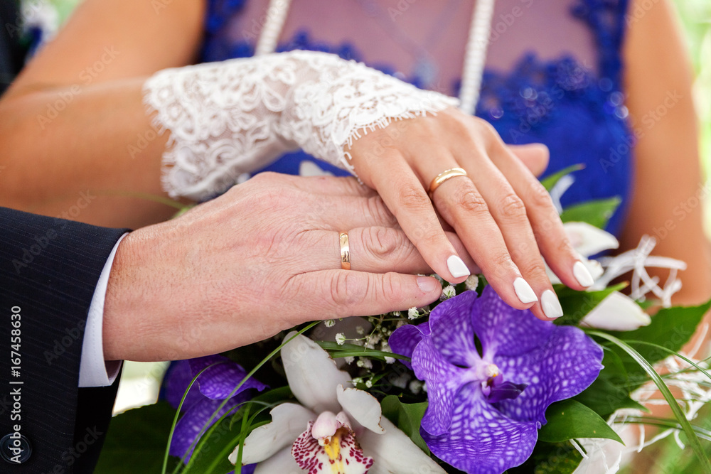 Fototapeta premium Hands of the bride and groom