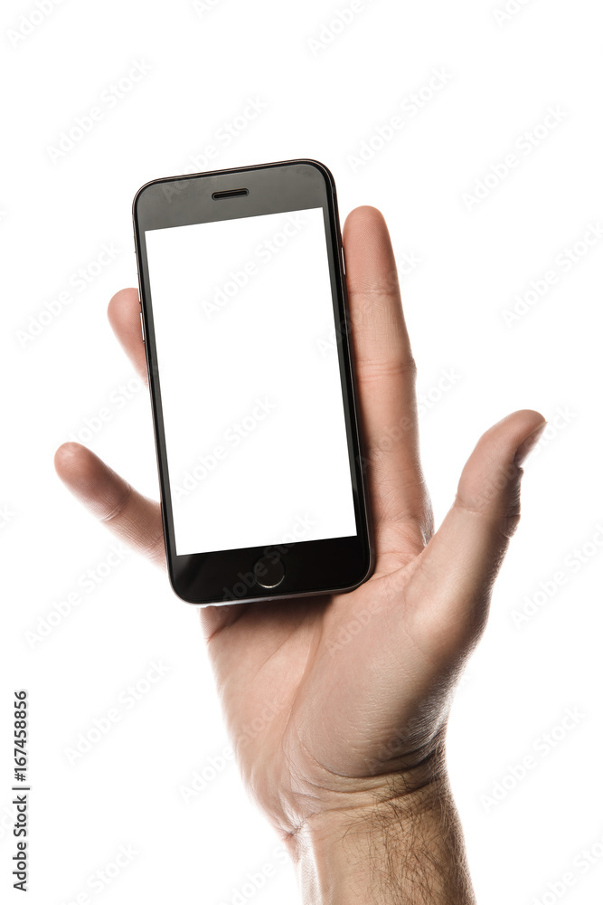 Hand holding smartphone, blank screen on white background Hand holding smartphone, blank screen on white background