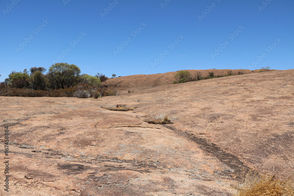 Walking on the Wave Rock in Australia, Hyden Western Australia Walking on the Wave Rock in Australia, Hyden Western Australia
