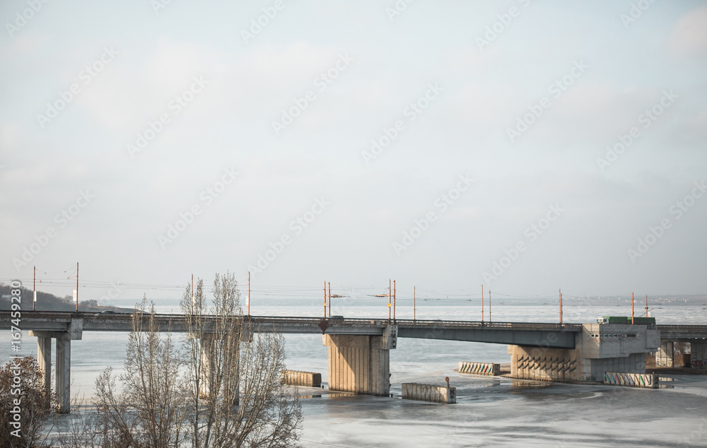 a bridge with passing cars on it