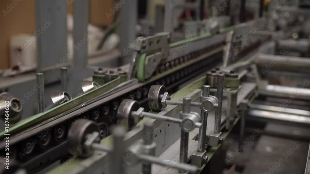 conveyor belt folding cardboard packaging in print factory conveyor belt folding cardboard packaging in print factory