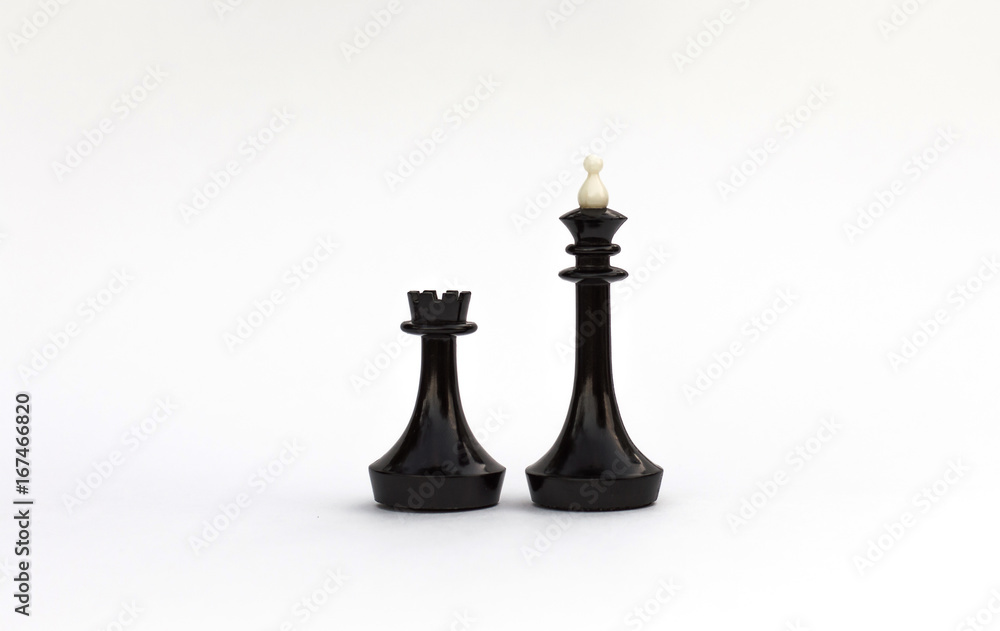 Chess pieces. The black king and rook on a white background. Castling