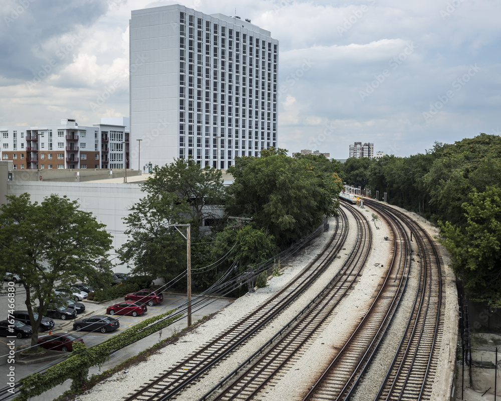 Fototapeta premium Tall building with tracks