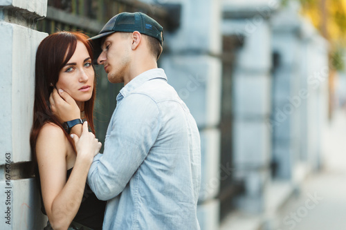 Wallpaper Mural Couple kissing happiness fun. Interracial young couple Torontodigital.ca