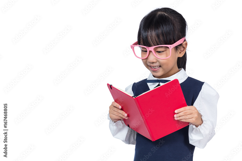 Asian Chinese primary school girl in uniform reading book Asian Chinese primary school girl in uniform reading book