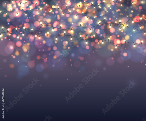 Fairy lights for festive decoration, realistic luminous bulbs. Colourful glowing Christmas garland with blur background and bokeh. Light effects for Christmas greeting cards, poster, flyer