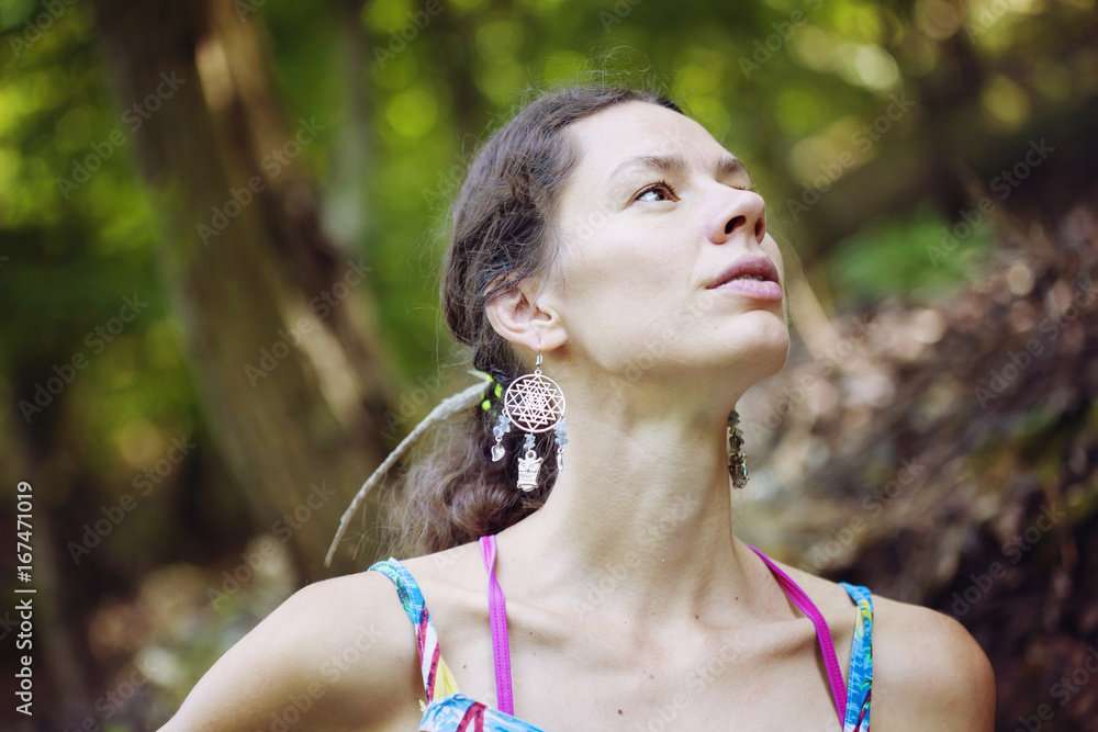 Beautiful girl enjoying nature in forest Beautiful girl enjoying nature in forest