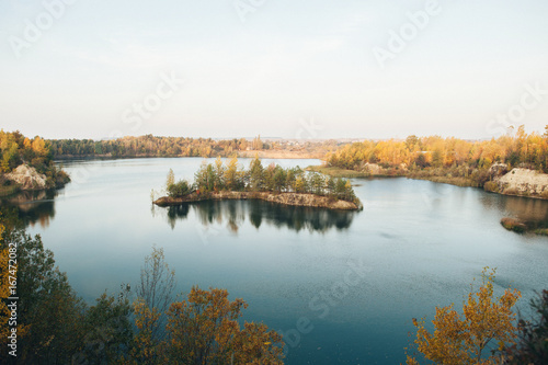 Norwegian summer landscape with small island on a lake