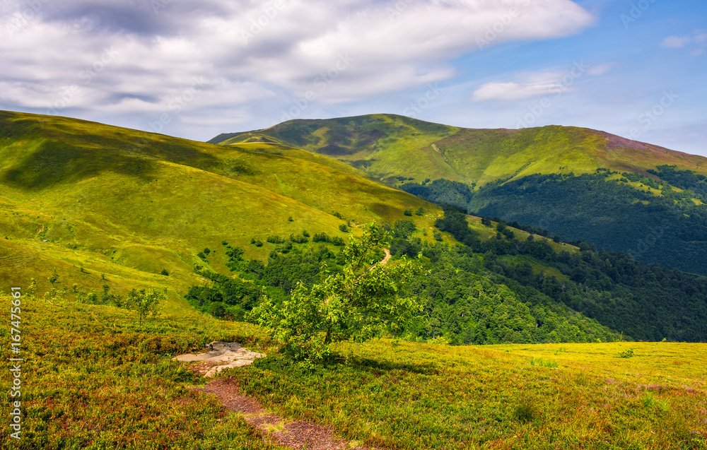 path on the edge of hillside on mountain ridge path on the edge of hillside on mountain ridge