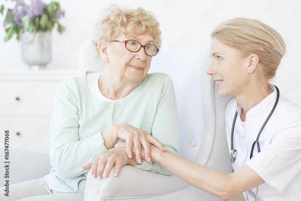 Friendly nurse visit old lady Friendly nurse visit old lady