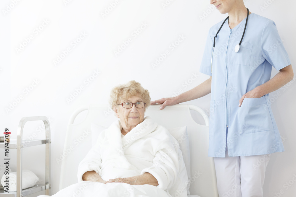 Obraz premium Young doctor in blue uniform