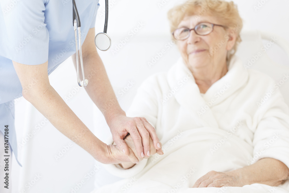 Obraz premium Doctor in blue uniform and with stethoscope