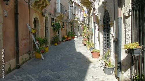 Typical old street, Ortigia Island, Italy, Sicily photo