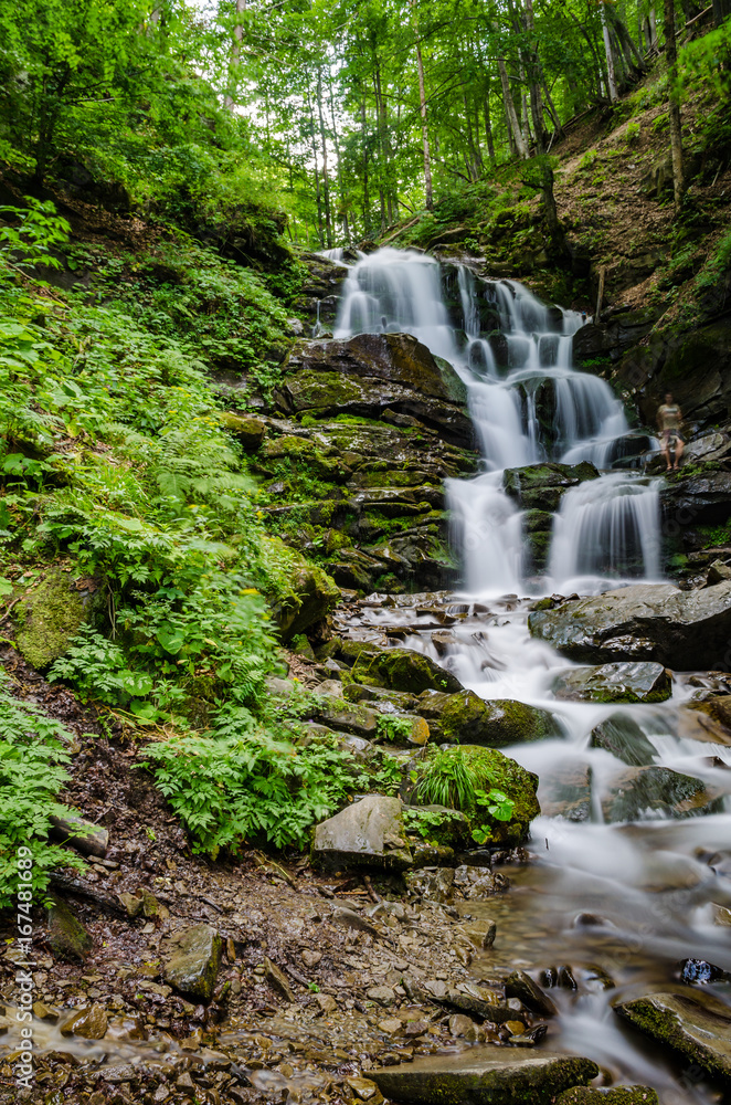 Obraz premium Landscape of waterfall Shypit in the Ukrainian Carpathian Mountains on the long exposure