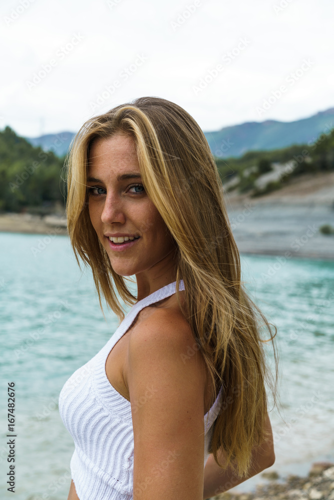 Content woman posing on shore Content woman posing on shore
