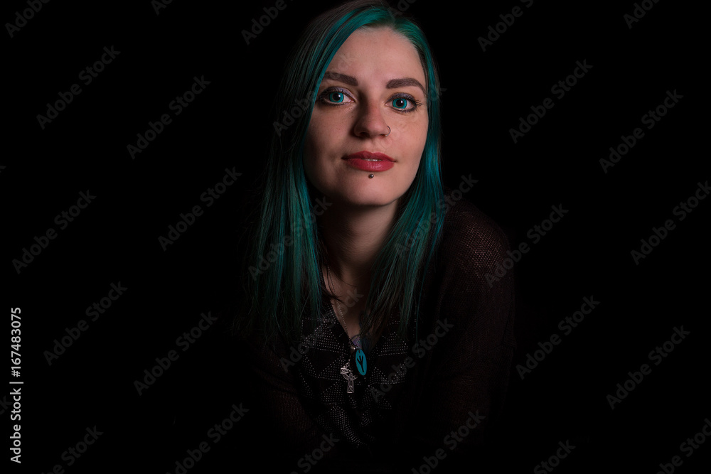 Green eye witch posing in studio