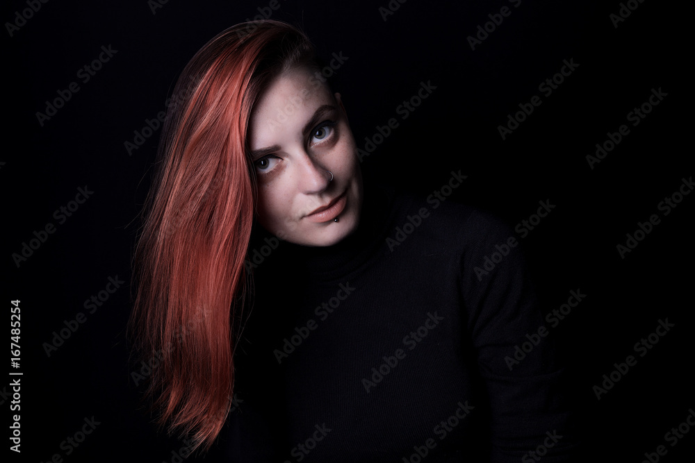 red hair girl posing in studio