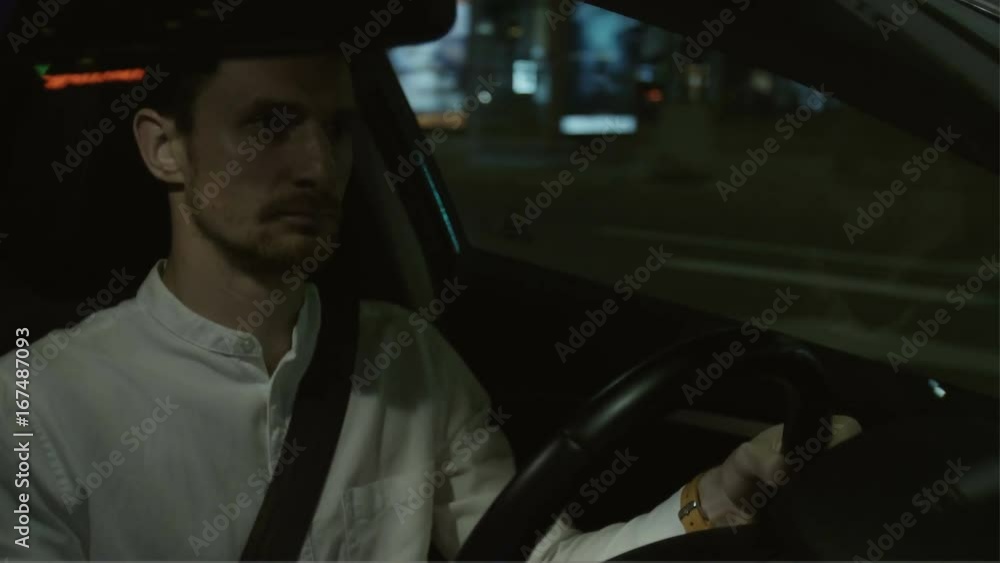 Young Businessman Doing a Sharp Right Turn With his Car Young Businessman Doing a Sharp Right Turn With his Car