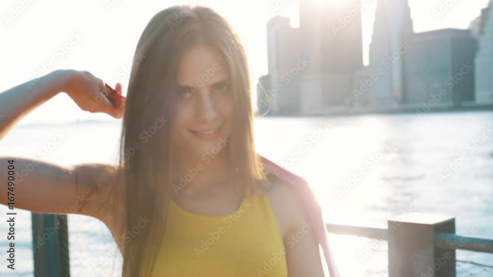 Young Beautiful Woman With American Flag in New York City Young Beautiful Woman With American Flag in New York City