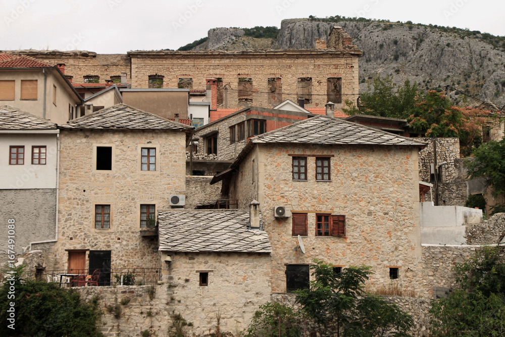 Old stone buildings near Old bridge in Mostar , Bosnia and Herzegovina