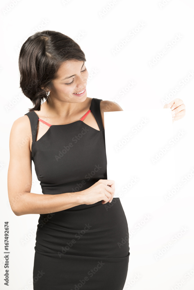 Beautiful young woman holding a blank sheet of paper Beautiful young woman holding a blank sheet of paper